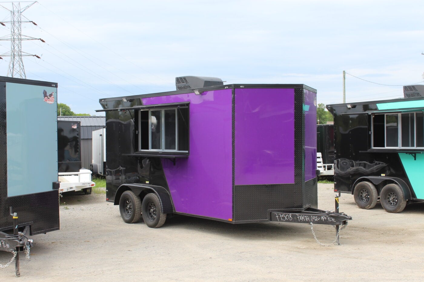 Purple and black concession trailer with serving window