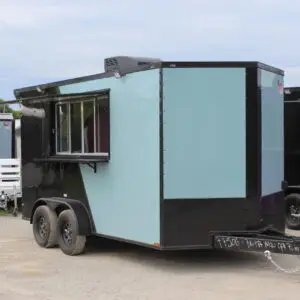 Light blue concession trailer with serving window open