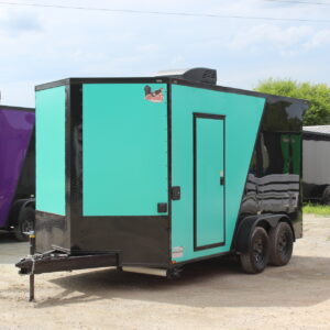 Teal and black enclosed cargo trailer outdoors