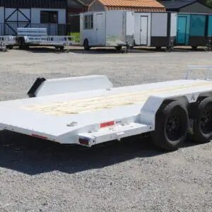 White dual-axle flatbed car hauler trailer