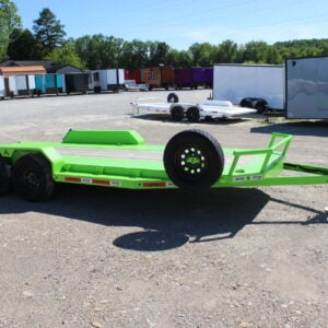 Bright green flatbed car hauler trailer on lot