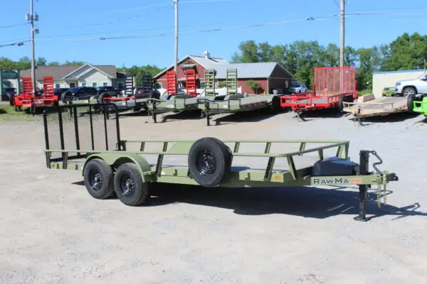 Green RawMaxx utility trailer on dealership lot