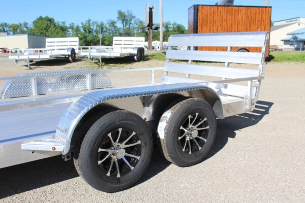Aluminum dual-axle utility trailer with black wheels