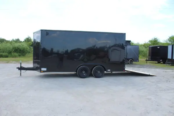Black enclosed cargo trailer with rear ramp door