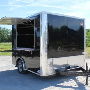Black enclosed cargo trailer with open serving window