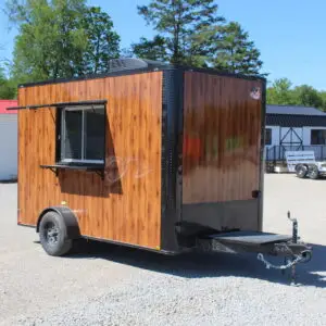 Wood-paneled mobile food trailer with serving window